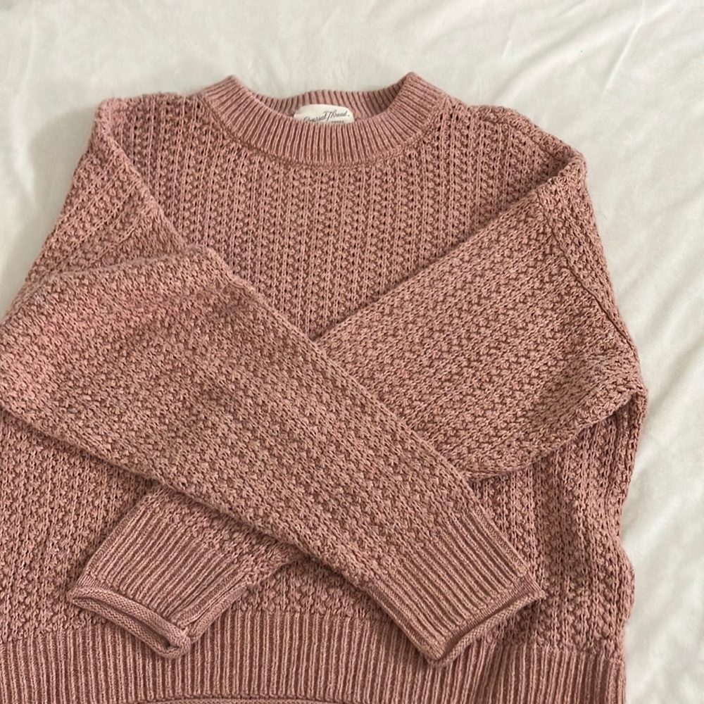 Pink knitted sweater